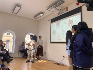 A group of students presenting their ideas.